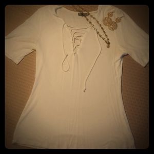 Silky soft cream colored top